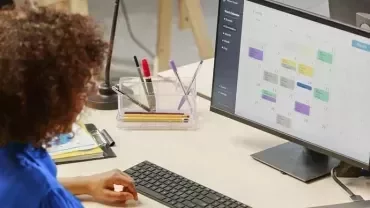 A woman in an office working.