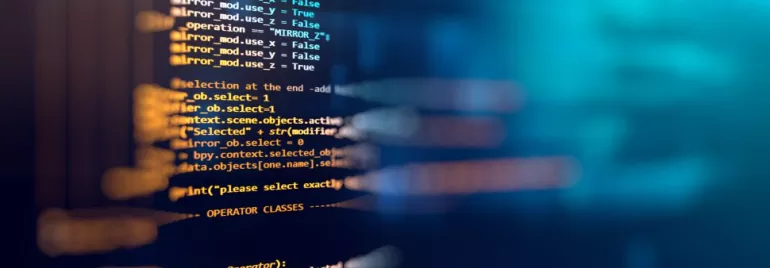 Código de computador colorido em tela, palavras destacadas em roxo e laranja.