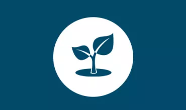 Ícone de uma planta em crescimento em um fundo azul.