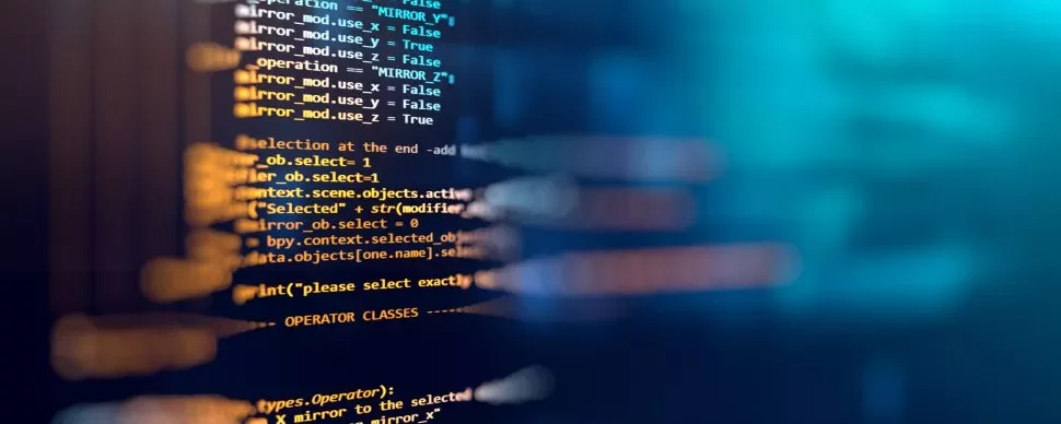 Código de computador colorido em tela, palavras destacadas em roxo e laranja.