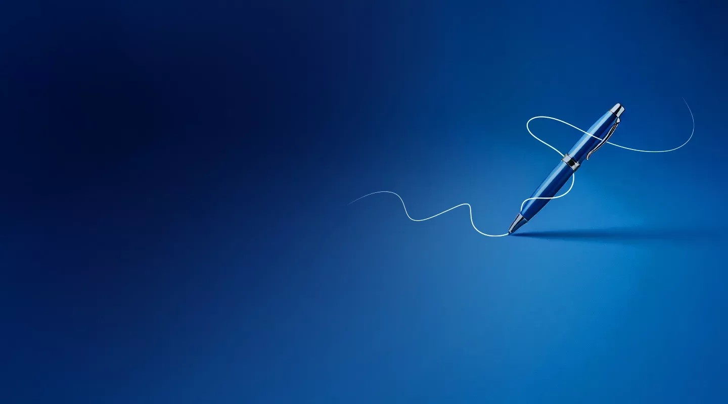 Caneta a escrever sobre um fundo azul gradiente