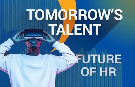 Pessoa usando óculos de realidade virtual com 'Tomorrow's Talent' ao fundo.